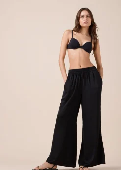 Glänzende Palazzohose