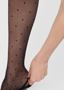 Transparente Strumpfhose mit Tupfen